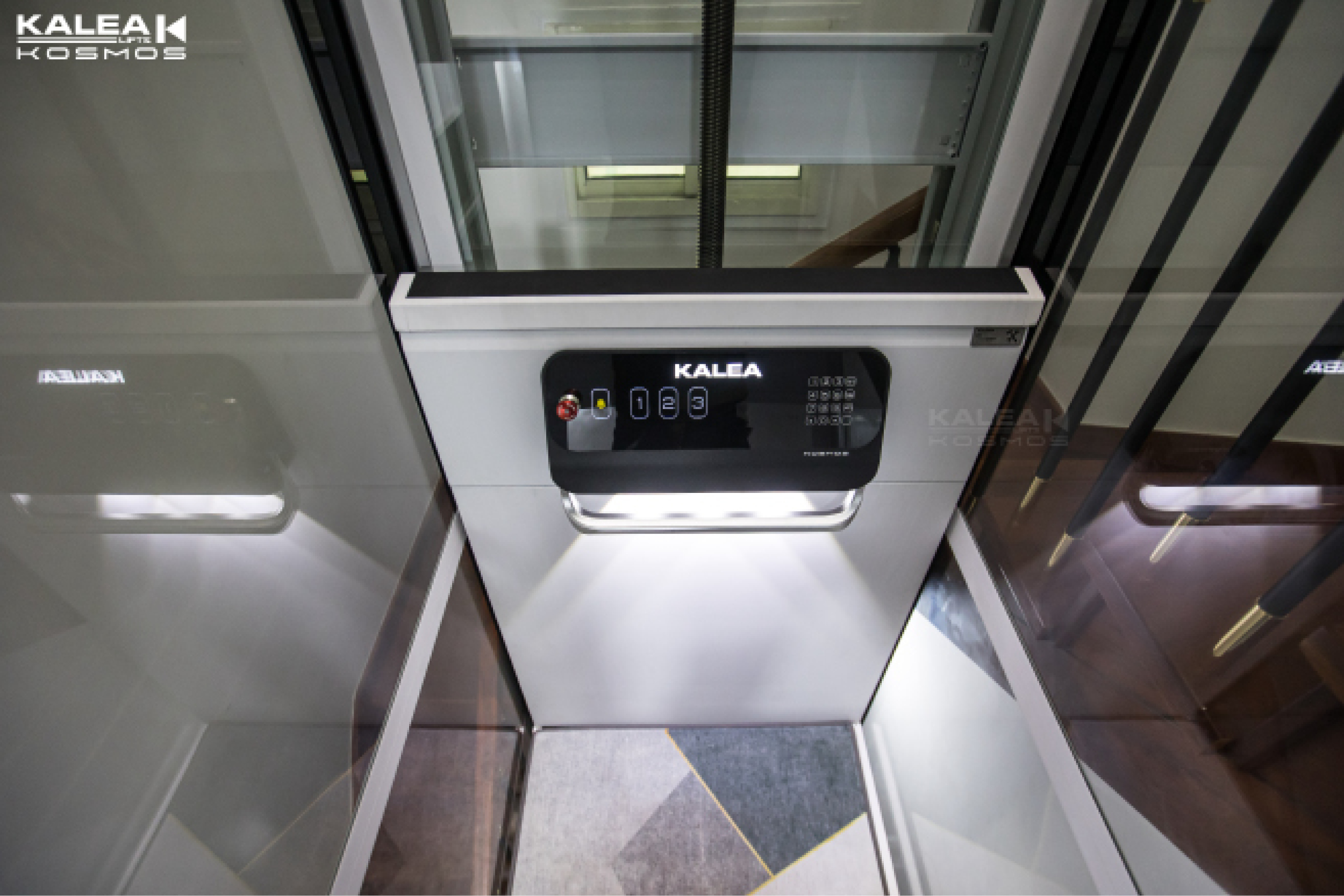 Private Home Middle Of Stair,Kosmos K90 model, All Glass Shaft Powder Coated White RAL9016